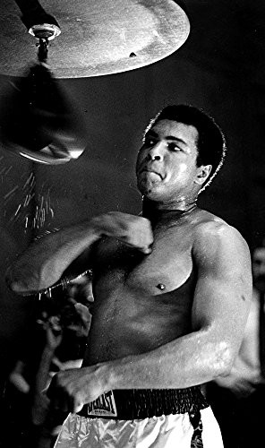 Muhammad Ali training with a punching bag Photo Print 8 x 10