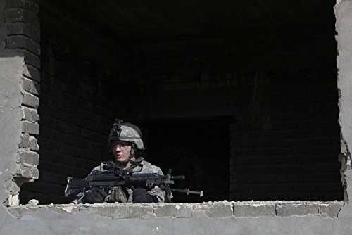 Posterazzi A U_S_ Army soldier provides security at a construction building in Iraq Poster Print 17 x 11
