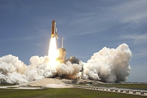 Posterazzi Shuttle Atlantis rumbles Coast as it Lifts Off from Kennedy Space Centers Launch Pad 39A Poster Print