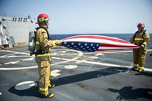 Posterazzi Firemen fold the American flag aboard USS William P_ Lawrence Poster Print 17 x 11