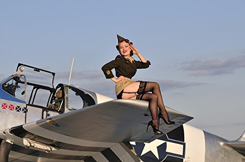 Posterazzi Pin-up girl sitting on the wing of a P-51 Mustang fighter plane Poster Print 17 x 11 Posterazzi Pin-up girl sitting on the wing of a P-51 Mustang fighter plane Poster Print 17 x 11
