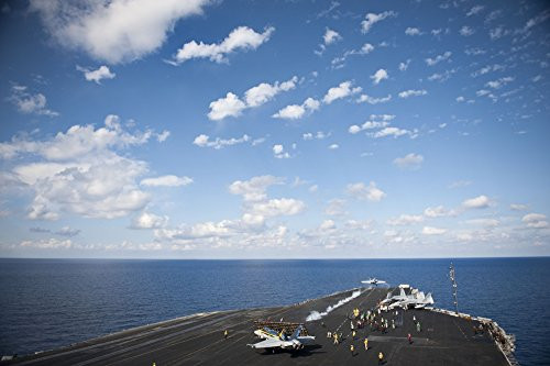 Posterazzi Mediterranean Sea October 22 2013-An FA-18C Hornet launches from the flight deck of the aircraft carrier USS Nimitz CVN 68_ Poster Print 17 x 11