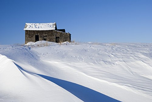 Posterazzi DPI1844775 Alberta Canada Abandoned Farm Building Atop A Snowy Hill Poster Print 17 x 11