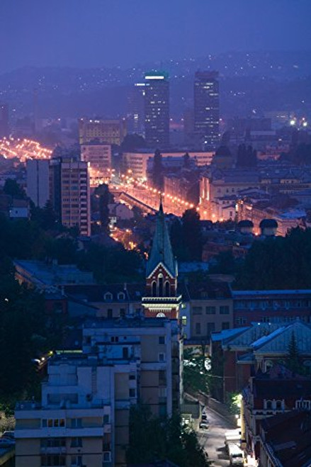 Posterazzi Buildings lit up at night in a city Sarajevo Bosnia and Hercegovina Poster Print 36 x 12