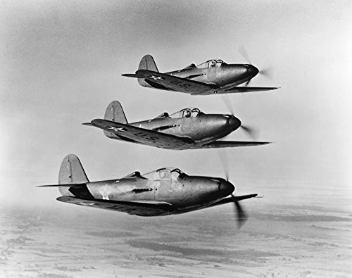 Wwii Fighter Planes Na Squadron Of Bell P-39 Airacobra Fighter Planes Of The Army Air Corps Flying In Formation During World War Ii Poster Print by 18 x 24