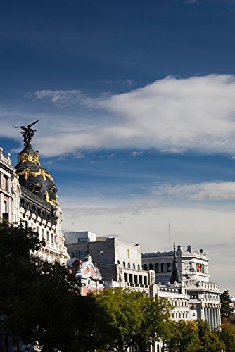 Low angle view of buildings along a street Calle De Alcala Centro Madrid Spain Poster Print by Panoramic Images 24 x 18