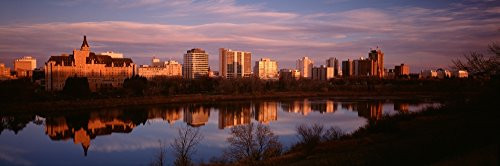 Posterazzi PPI90453L Canada Saskatchewan Saskatoon Buildings along a river Poster Print 36 x 12