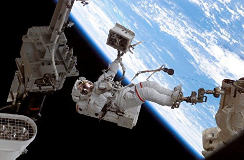 Posterazzi GLP469052LARGE Poster Print Collection Astronaut Secured To A Foot Restraint On The End Of Canadarm2 Poster Print By Stock trek Images 17 X 11 Multicolored