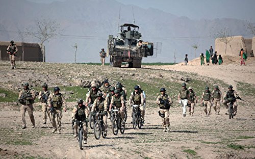 Posterazzi Poster Print Collection Dutch Soldiers Riding a Bicycle on a Foot Patrol in Afghanistan VwpicsStocktrek Images 17 x 11 Multicolored