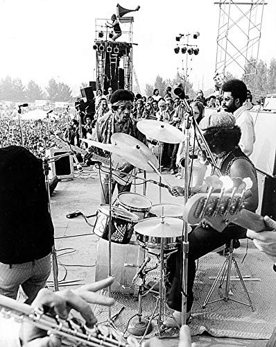 Jimi Hendrix performing at Newport Rock in 1969 Photo Print  8 x 10