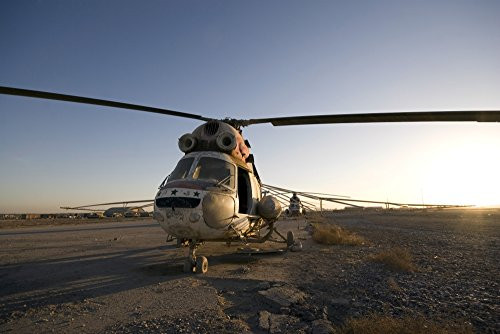 Posterazzi PSTTMO100023M Baqubah Iraq - An Iraqi Mi-2 helicopter sits on the flight deck abandoned at Camp Warhorse Poster Print 17 x 11