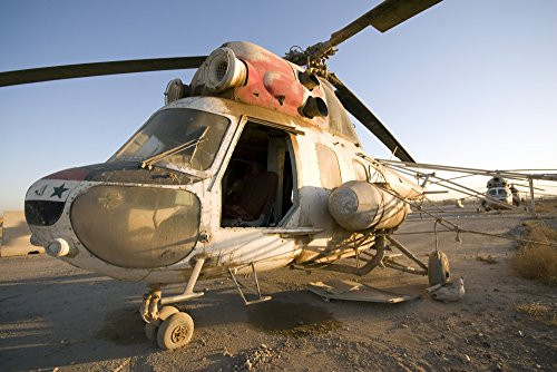Posterazzi PSTTMO100025M Baqubah Iraq - An Iraqi Mi-2 helicopter sits on the flight deck abandoned at Camp Warhorse Poster Print 17 x 11