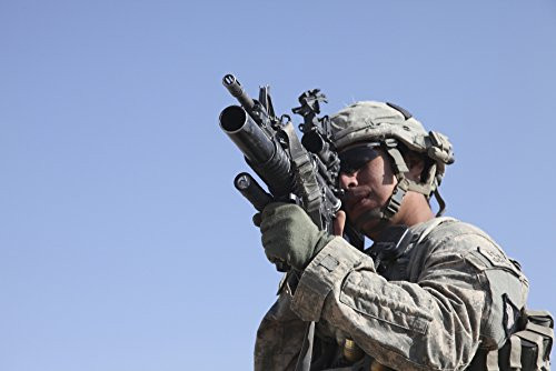 Posterazzi January 12 2011-U.S. Army soldier scans the area with an M203 grenade launcher during an operation to clear insurgents in southern Howz-e-Madad Afghanistan Poster Print 17 x 11