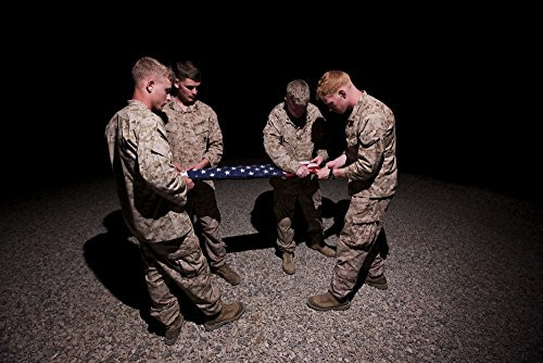 Posterazzi PSTTMO100526M U.S. Marines fold the American Flag on a military base in Northern Afghanistan Poster Print 17 x 11