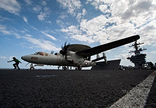 An E-2C Hawkeye aircraft prepares to launch from the flight deck of USS Carl Vinson Poster Print by Stocktrek Images 17 x 11