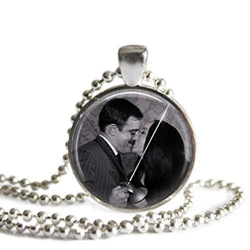 Morticia and Gomez Addams Fencing 1 inch Picture Pendant Necklace or Keychain
