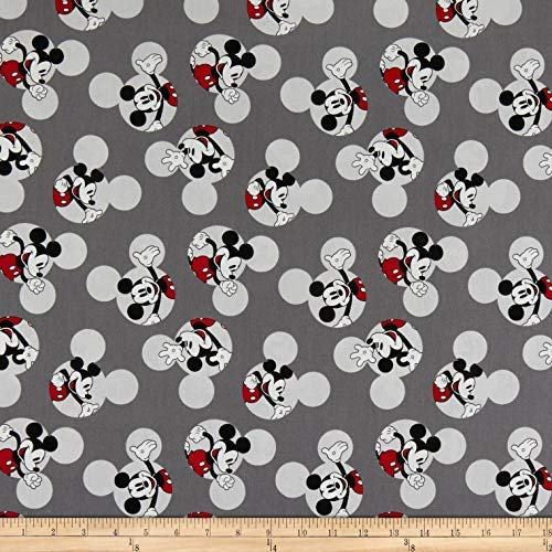 Springs Textiles Disney Traditional Mickey Head Toss Gray Sold by 1 2 of a Yard.