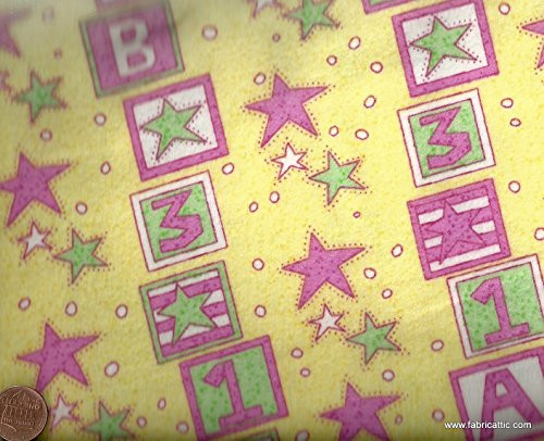Yellow and pink ABC blocks and stars Camelot flannel fabric