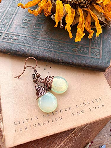 Creamy Yellow teardrop Czech glass and copper wire wrapped earrings.