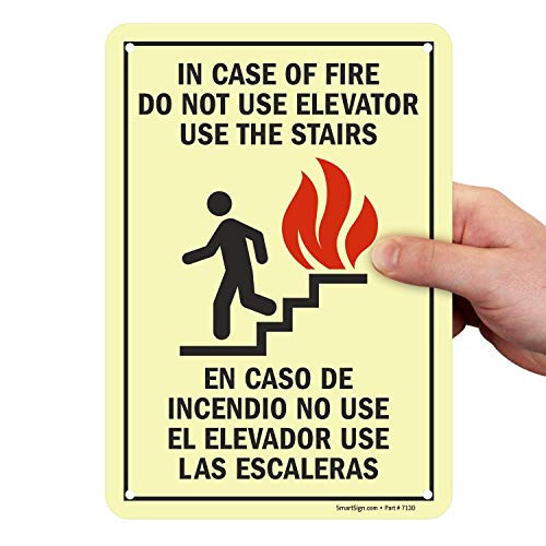 SmartSign "In Case Of Fire - Do Not Use Elevator, Use Stairs" Bilingual Sign - 7" x 10" Glow-in-the-Dark Aluminum