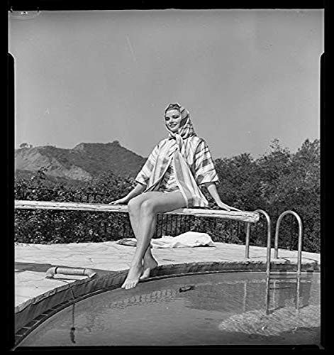 Posterazzi DAP18320 Grace Kelly - Legs Crossed on Diving Board Photo Print, 8 x 10, Multi