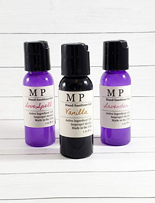 Lavender Vanilla Love spell Scented Hand Sanitizers 75 percent Isopropyl Alcohol Sanitizer Made with alcohol Vitamin E Aloe vera gel 3 pack travel size essential oils Purple plastic bottles click tops