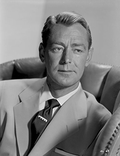 Posterazzi Alan Ladd sitting on a Bucket Seat Photo Poster Print, (8 x 10)