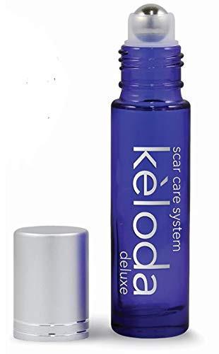 KELODA Deluxe Scar  and  Keloid Removal Oil  and  Massager- 0.33 oz | For Treatment of Surgical Scars and Piercing Keloids- Acne- Burns | With Coconut- Shea- Turmeric- Lavender- Helichrysum Oils and Vitamin E