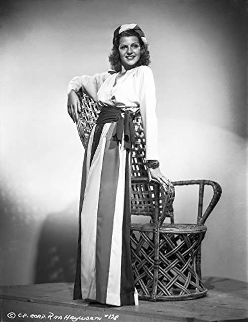 Rita Hayworth Leaning on Arm Chair Photo Print (8 x 10) Rita Hayworth Leaning on Arm Chair Photo Print (8 x 10)