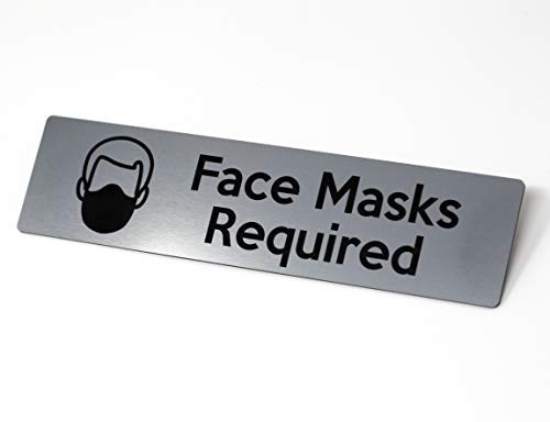 Face Masks Required Sign - Laser Engraved Acrylic Sign with a Brushed Stainless Steel finish - Safety Office Sign for Social Distancing and Coronavirus Protection - 9" x 2.25"