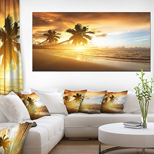 Designart PT9423-60-28 Caribbean Seashore Sunset Seascape Photo Canvas Art Print (1 Piece) 28'' x 60'' x 2'' Yellow Designart PT9423-60-28 Caribbean Seashore Sunset Seascape Photo Canvas Art Print (1 Piece) 28'' x 60'' x 2'' Yellow