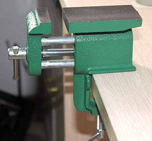 YOU+Small clamp on a bench vise with anvil