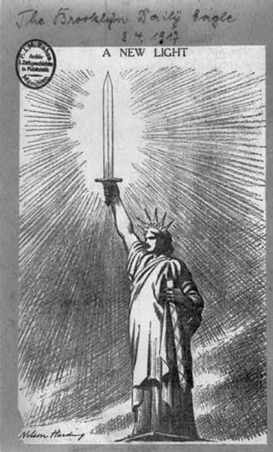 HistoricalFindings Photo: New Light,Political Cartoon,1917,Statue of Liberty,Holds Sword Instead of Torch HistoricalFindings Photo: New Light,Political Cartoon,1917,Statue of Liberty,Holds Sword Instead of Torch
