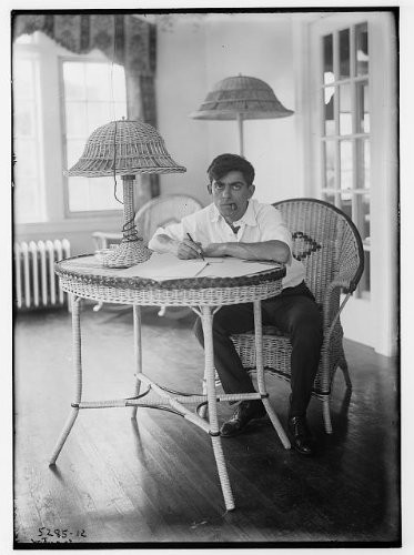 HistoricalFindings Photo: Eddie Cantor,Smoking Cigars,Tables,Paperwork,pens,Wicker Furniture,Lamps,Chair