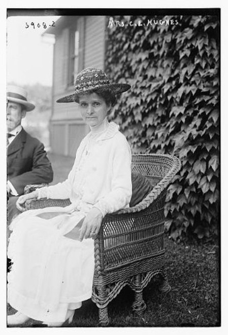 HistoricalFindings Photo: Mrs. C.E. Hughes,Antoinette Carter Hughes,Seated in Wicker Chair Outside HistoricalFindings Photo: Mrs. C.E. Hughes,Antoinette Carter Hughes,Seated in Wicker Chair Outside