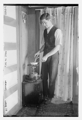 HistoricalFindings Photo: at Broad Channel - The Oil Stove,Man,Curtain,Bain News Service