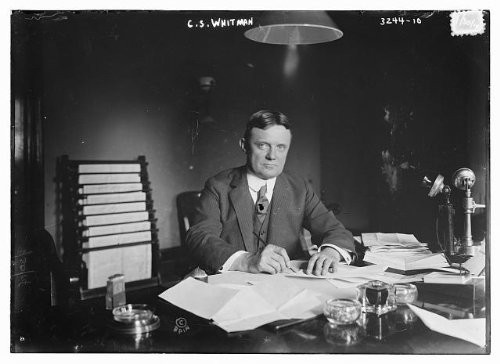 HistoricalFindings Photo: C.S. Whitman,Seated Behind Desk,Papers