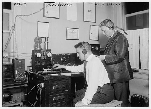 HistoricalFindings Photo: L.M. Cockaday,Major Banning,radios,Communication Devices,desks,Headphones,Men
