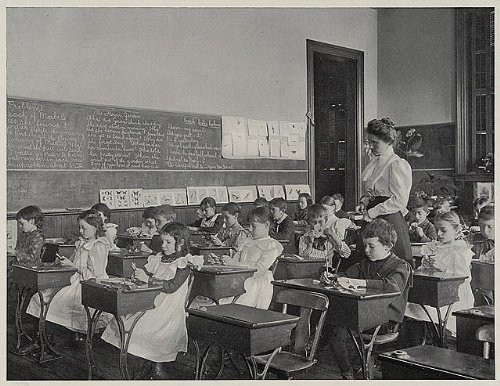 HistoricalFindings Photo: Pattern Making,1900,School Children Cutting Paper into Leaf Shapes,Teacher,desks
