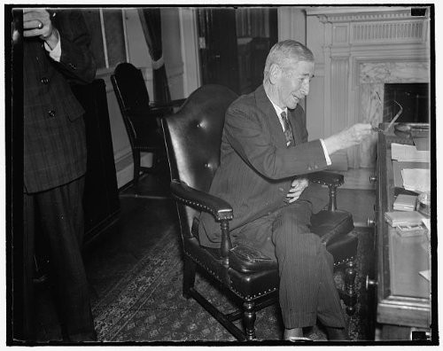 HistoricalFindings Photo: Secretary,Navy Claude A Swanson,Holding Glasses,Desk,Office,Washington DC,1937