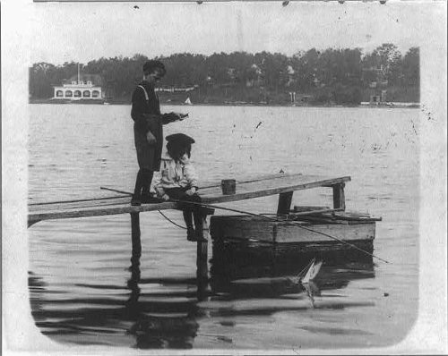 HistoricalFindings Photo: Side by Side,Two Children on pier,c1900,Water,Stick,hat