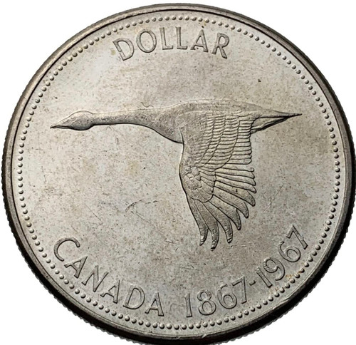 1967 Royal Canadian Mint 1 Dollar Canada Silver Coin. Centennial Celebrations Commemorative Coin Issued Under Queen Elizabeth II. 1 Dollar Graded By Seller Circulated/Worn Condition