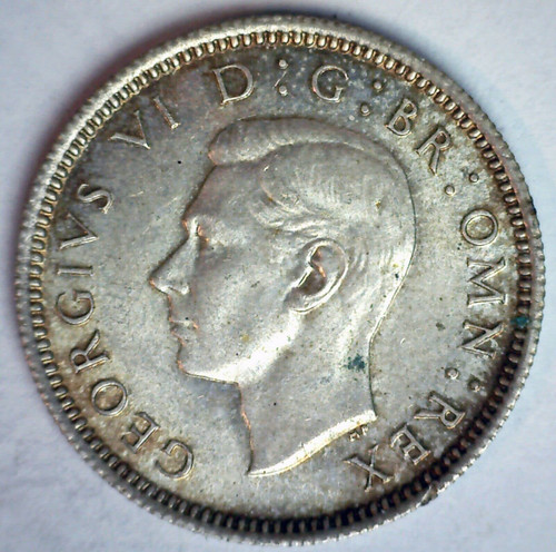 1939-1945 British Sixpence Silver Coin Issued Under King George VI. WW2 Era United Kingdom Coin. Sixpence Graded By Seller Circulated/Worn Condition 1939-1945 British Sixpence Silver Coin Issued Under King George VI. WW2 Era United Kingdom Coin. Sixpence Graded By Seller Circulated/Worn Condition