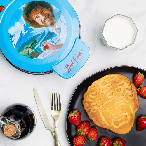Uncanny Brands Bob Ross Waffle Maker - Bob's Iconic Face on Your Waffles - Waffle Iron Uncanny Brands Bob Ross Waffle Maker - Bob's Iconic Face on Your Waffles - Waffle Iron