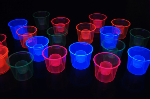 DirectGlow 4 Ounce Assorted UV Blacklight Reactive Soft Plastic Bomber Glow Party Shot Glass Cups (20 Count)