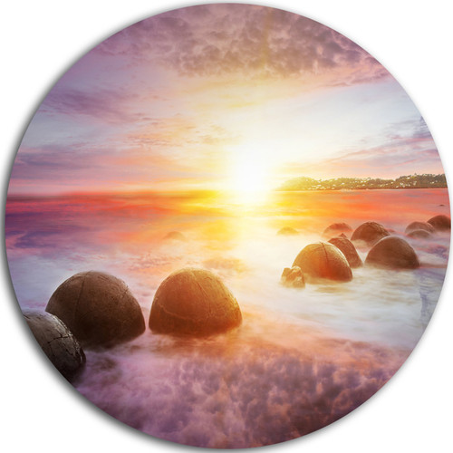 Designart Evening Sun Over Moeraki Boulders-Seashore Photo Circle Wall Art-Disc of 23, 23" x 23", Yellow