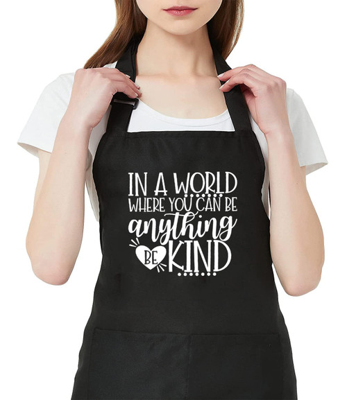 TSIIUO In a World Where You Can Be Anything Kindness Apron Women Waterproof Adjustable Bib Cooking Apron with 2 Pockets Black