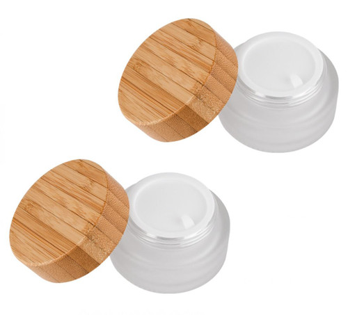 2 Pack 50ml 1.7oz Round Glass Jar Cosmetic Containers Cream Bottle Container Makeup Cosmetics Container Sample Jars with Inner Liner and Wood Lid for Lotion Cream