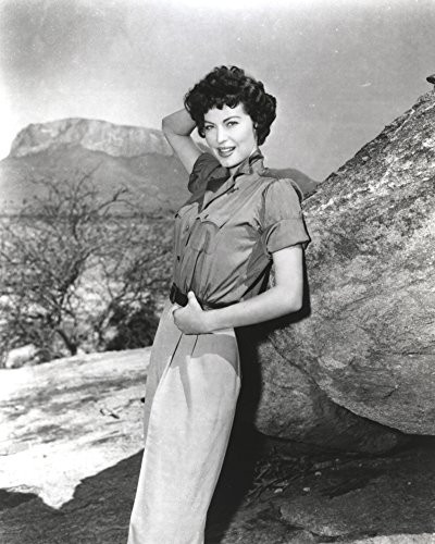 Ava Gardner Leaning on a Rock with a smiling Pose Photo Print (8 x 10)