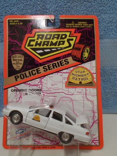 ROAD CHAMPS, 1/43 SCALE, DIE CAST MODEL, FORD CROWN VICTORIA, HERSHEY'S CANDY PATROL, (WHITE)